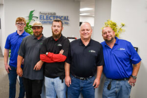 Design and Build Electrical Contractors Employees in Office.